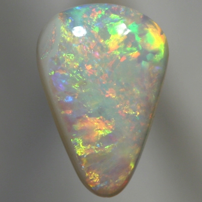 SOLID SEMI BLACK OPAL Sparkling gold fire, orange and yellow with green
